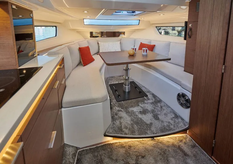 Slide: The Image of Luxurious interior of 2024 Jeanneau Leader 10.5 Walk Around with cozy seating and modern amenities. - 4