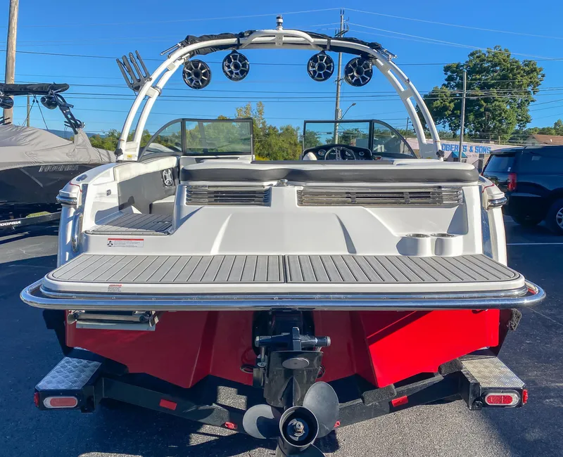 Slide: The Image of 2018 Bryant Speranza boat, rear view with wakeboard tower and speakers. - 4