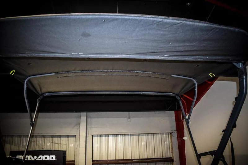 Slide: The Image of 2022 Sea-Doo Switch Sport 21 canopy in a showroom. - 11