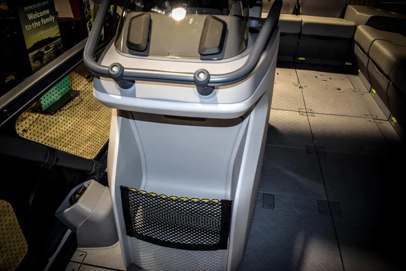 Slide: The Image of Interior of 2022 Sea-Doo Switch Sport 21 pontoon boat with seating and storage. - 12