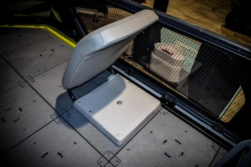 Slide: The Image of 2022 Sea-Doo Switch Sport 21 interior seat and storage compartment. - 9