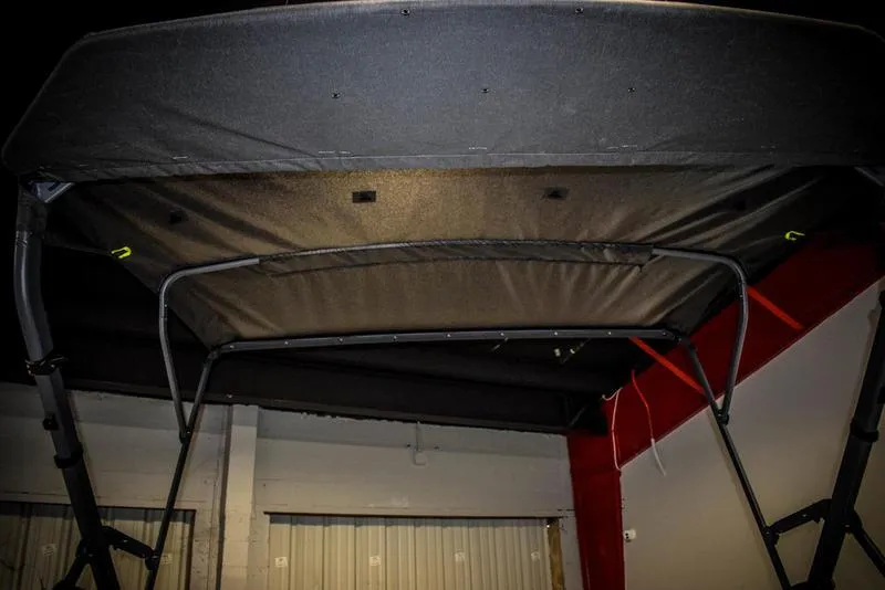 Slide: The Image of 2023 Sea-Doo Switch Sport 21 canopy frame in a showroom. - 10