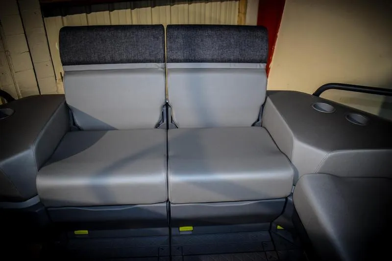 Slide: The Image of 2023 Sea-Doo Switch Sport 21 interior seating with cup holders. - 11