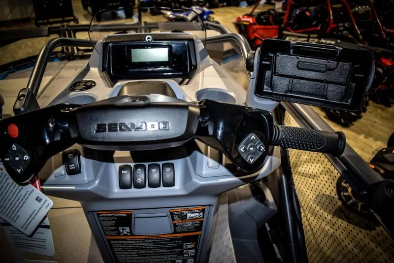 Slide: The Image of 2023 Sea-Doo Switch Sport 21 dashboard and controls. - 12
