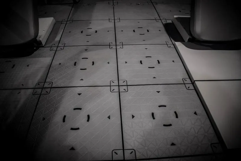 Slide: The Image of 2023 Sea-Doo Switch Sport 21 deck with modular tile design. - 6