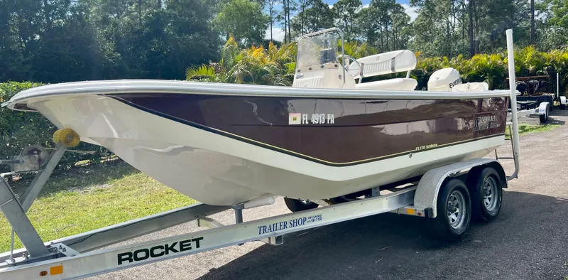 Slide: The Image of 2010 Carolina Skiff 198 DLV Elite boat on a Rocket trailer. - 4
