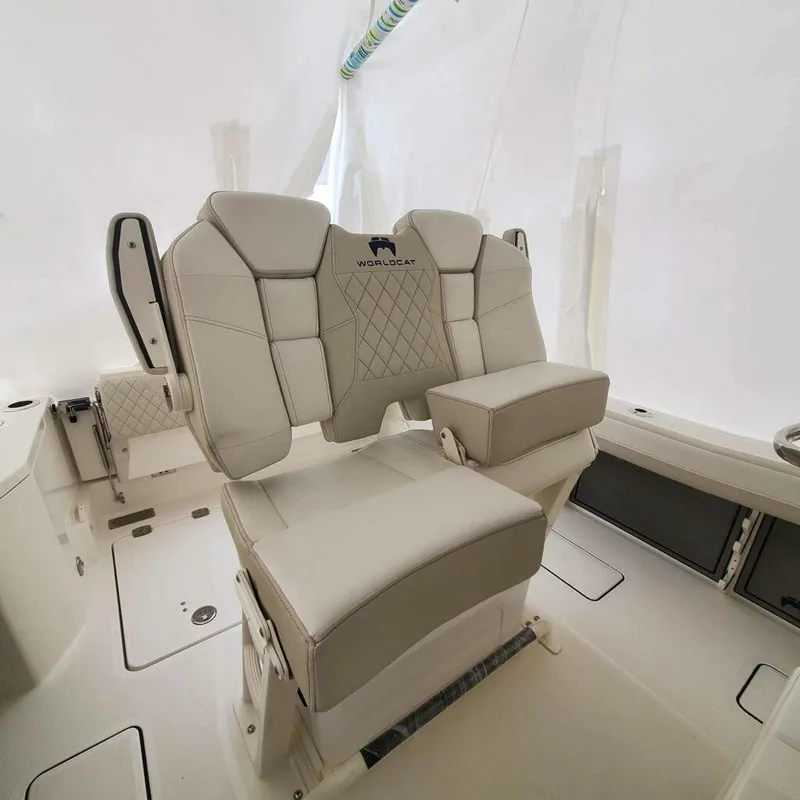 Slide: The Image of 2023 World Cat 260CC-X boat interior with luxurious seating. - 2