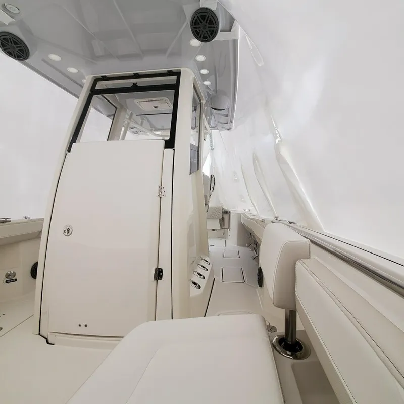 Slide: The Image of Interior of 2023 World Cat 260CC-X boat with modern seating and sleek design. - 6