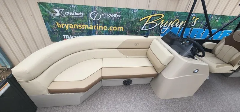 Slide: The Image of 2023 Veranda VISTA20RC Bi-Toon boat interior with beige seating at Bryan's Marine. - 10