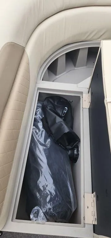 Slide: The Image of Storage compartment in 2023 Veranda VISTA20RC Bi-Toon boat. - 19