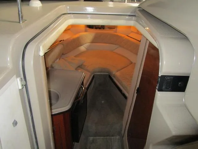 Slide: The Image of Rear view of 2006 Sea Ray 240 Sundancer boat with propeller and ladder. - 13