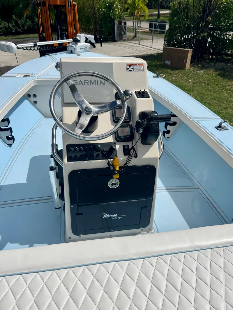 Slide: The Image of 2011 Maverick 18 HPX-V boat console with Garmin navigation system. - 16