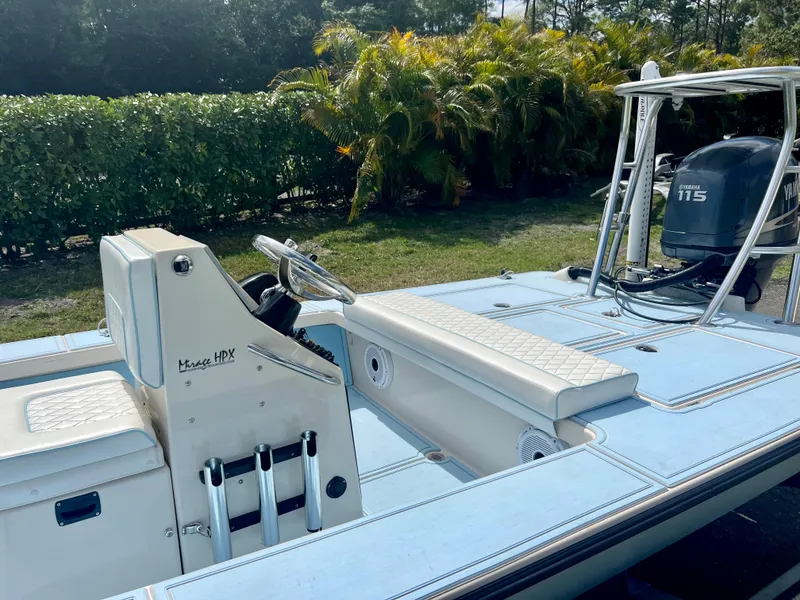 Slide: The Image of 2011 Maverick 18 HPX-V boat with Yamaha 115 outboard motor. - 18