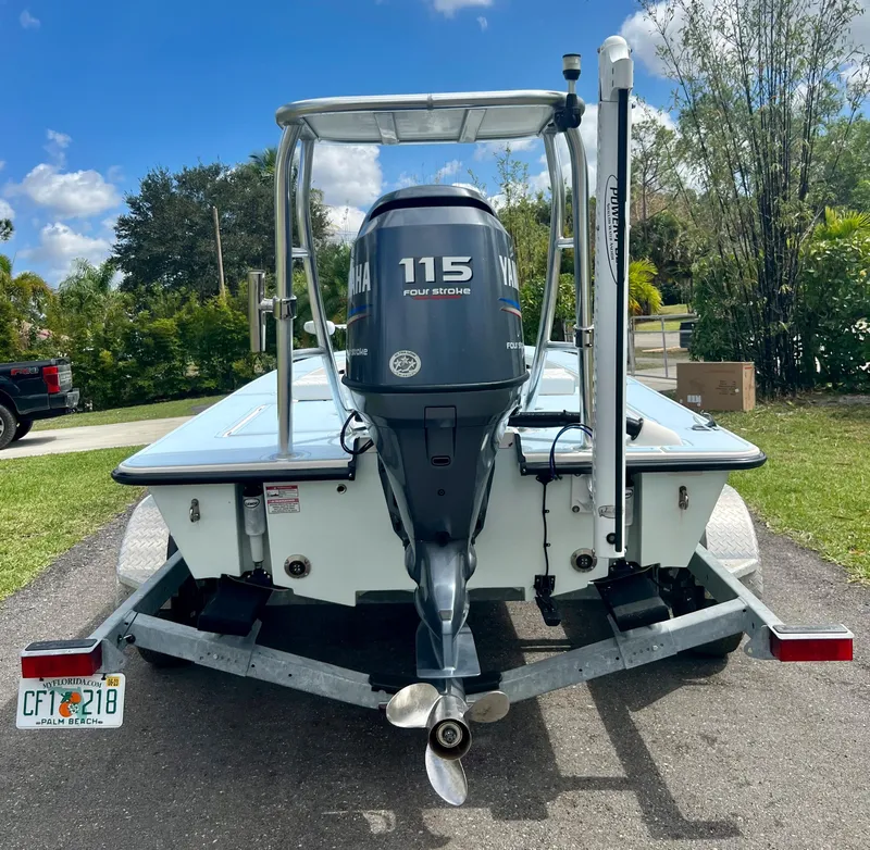 Slide: The Image of 2011 Maverick 18 HPX-V boat with Yamaha 115 four-stroke engine on trailer. - 20