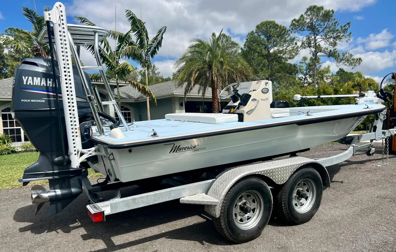 Slide: The Image of 2011 Maverick 18 HPX-V boat on a trailer with Yamaha outboard motor. - 4