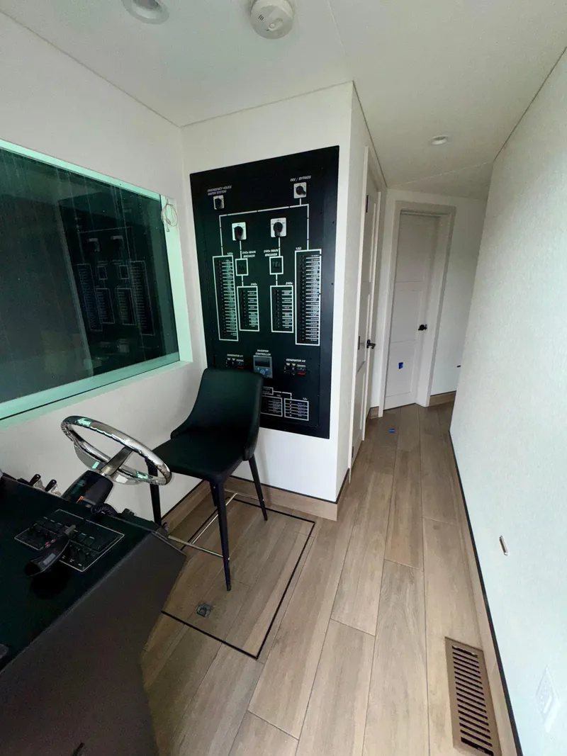 Slide: The Image of Modern control room with schematic wall design, featuring Adonia Solace Trip #10, 2021 model. - 11