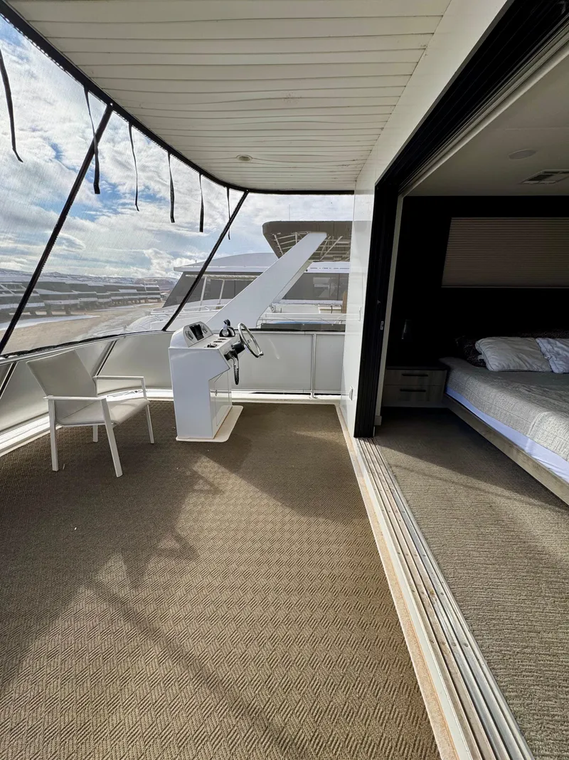 Slide: The Image of Luxury yacht interior with helm, seating, and bedroom; Adonia Solace Trip #10, 2021 model. - 17