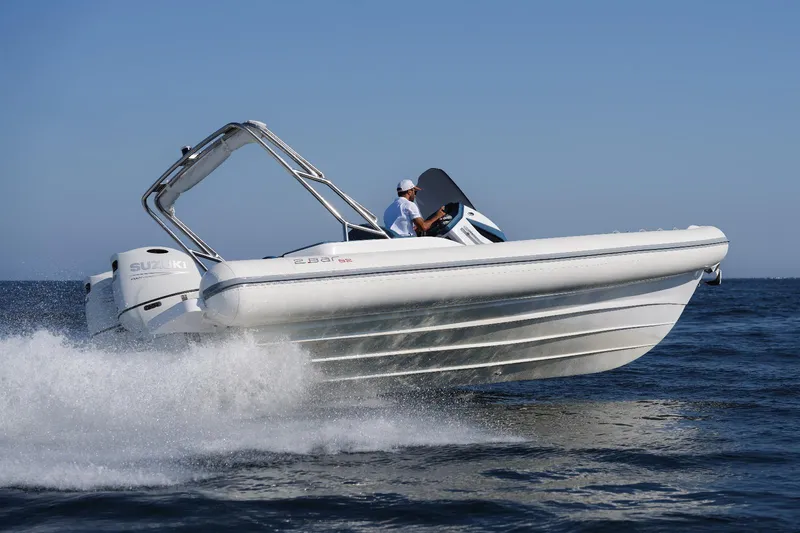 Slide: The Image of 2025 2 Bar 8.2 boat speeding on the water. - 7