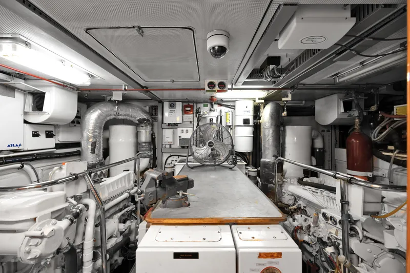 Slide: The Image of Engine room of 2001 Cheoy Lee Expedition 70 yacht, featuring machinery and equipment. - 20