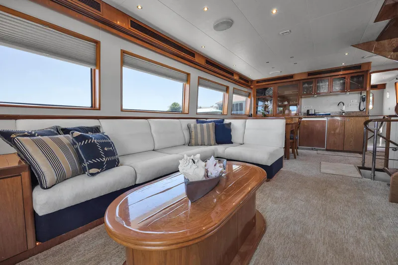 Slide: The Image of Luxurious interior of 2001 Cheoy Lee Expedition 70 yacht with elegant seating and wooden accents. - 32