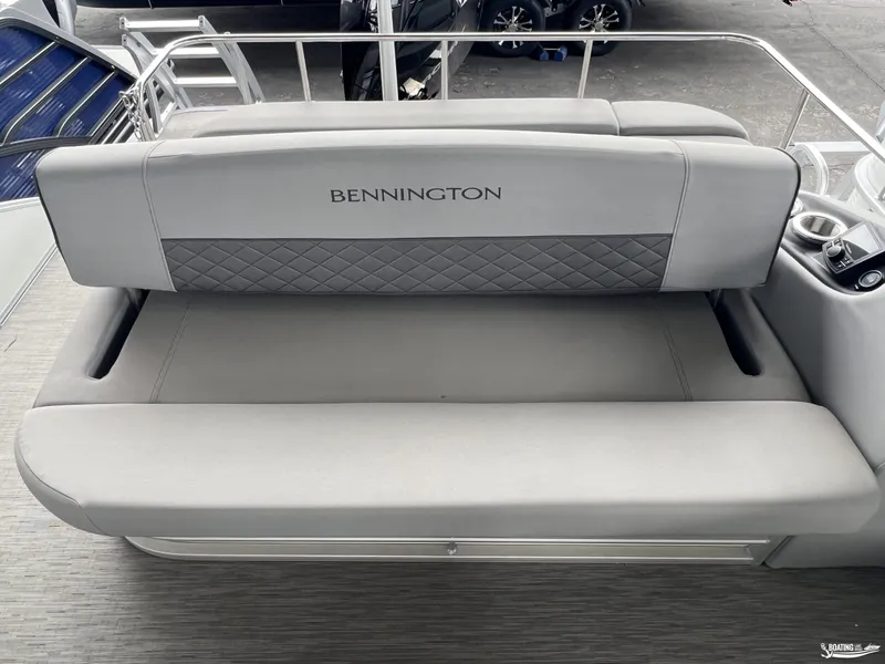 Slide: The Image of 2023 Bennington 23LSB boat seat with gray upholstery and diamond pattern. - 10