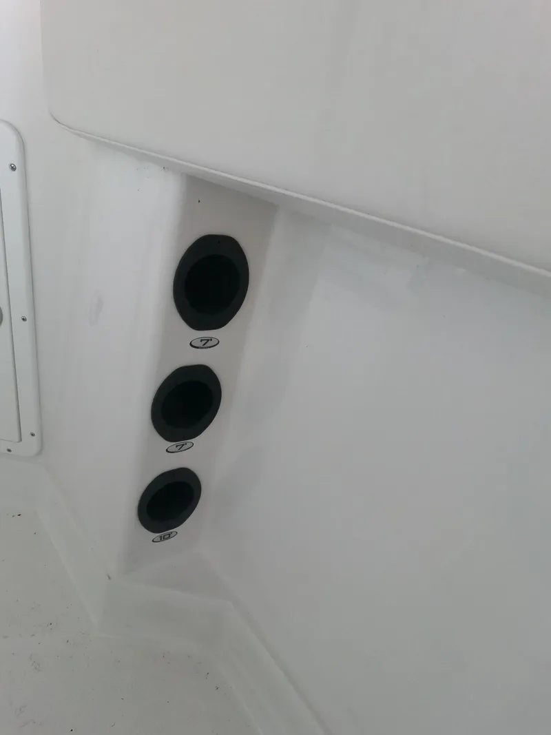 Slide: The Image of 2023 Tahoe 2150 CC boat interior with cup holders. - 9