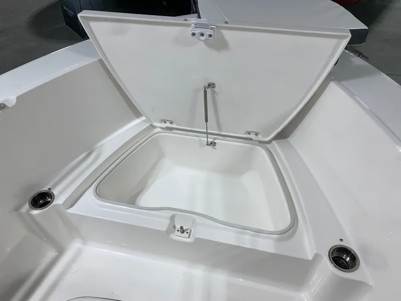 Slide: The Image of 2024 Robalo R180 Center Console boat storage compartment. - 7
