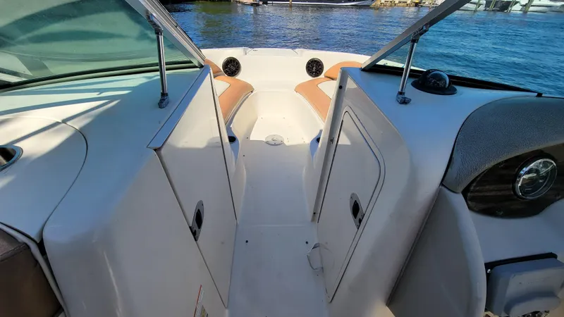 Slide: The Image of Interior view of 2007 Sea Ray SunDeck 200 boat with seating and open deck. - 22