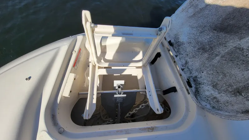 Slide: The Image of 2007 Sea Ray SunDeck 200 anchor storage compartment with ladder. - 29