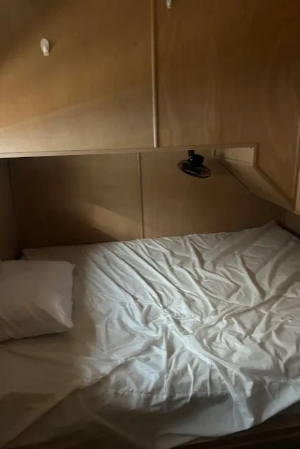Slide: The Image of Cozy cabin bed in 2001 Stardust Cruisers Desert Oasis Week #30 houseboat. - 12
