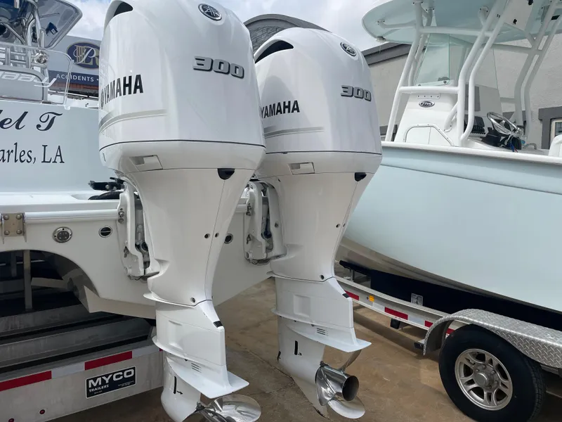 Slide: The Image of Twin Yamaha 300 outboard engines on a 2019 Freeman 37 boat. - 11