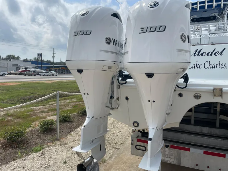 Slide: The Image of Twin Yamaha 300 outboard motors on a 2019 Freeman 37 boat. - 12