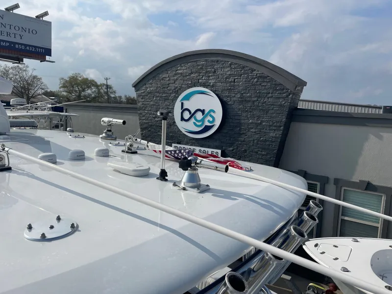 Slide: The Image of Freeman 37 boat, 2019 model, displayed at a dealership with BGS logo. - 20
