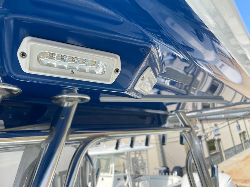 Slide: The Image of Close-up of 2019 Freeman 37 boat's blue canopy with LED lights. - 24