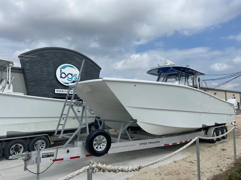 Slide: The Image of 2019 Freeman 37 boat on Myco trailer at marine dealership. - 3
