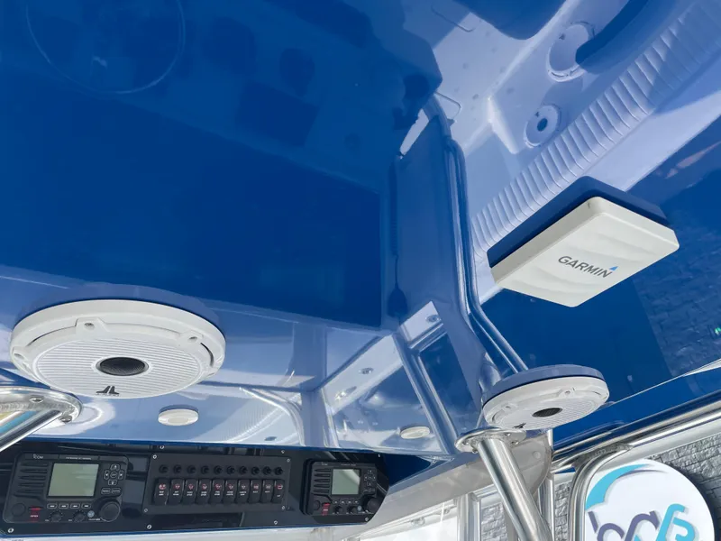 Slide: The Image of Freeman 37 boat interior, 2019 model, featuring Garmin electronics and audio system. - 33