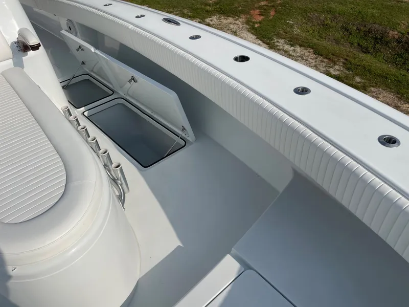 Slide: The Image of 2019 Freeman 37 boat interior with open storage compartments. - 37