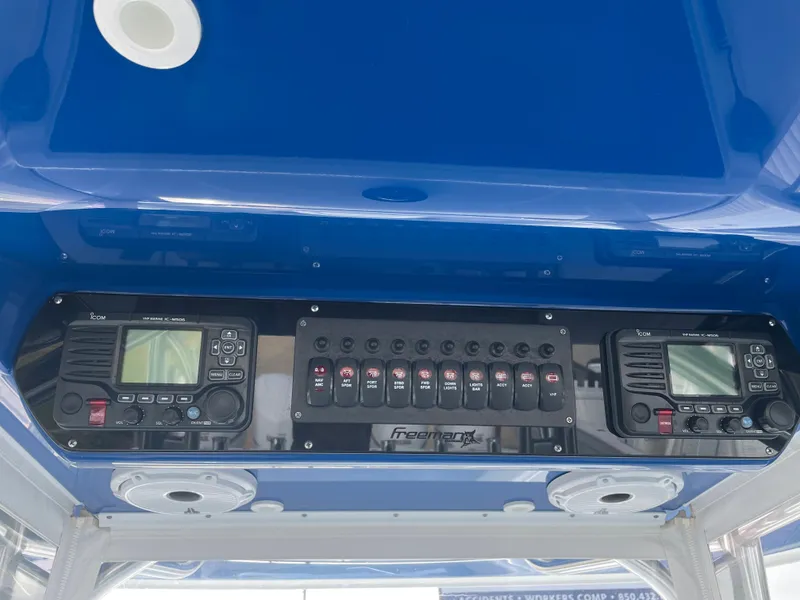 Slide: The Image of Control panel of a 2019 Freeman 37 boat with navigation and communication systems. - 41