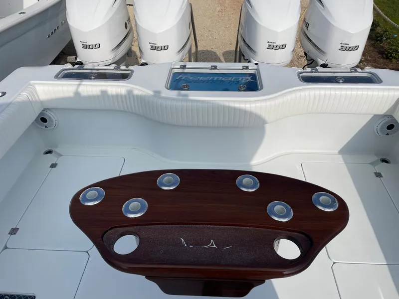 Slide: The Image of Freeman 37 boat, 2019 model, with four 300 horsepower engines and a wooden fishing station. - 47