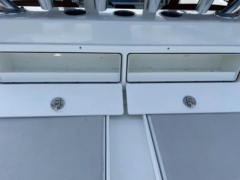 Slide: The Image of Freeman 37 boat storage compartments, 2019 model, open and empty. - 48