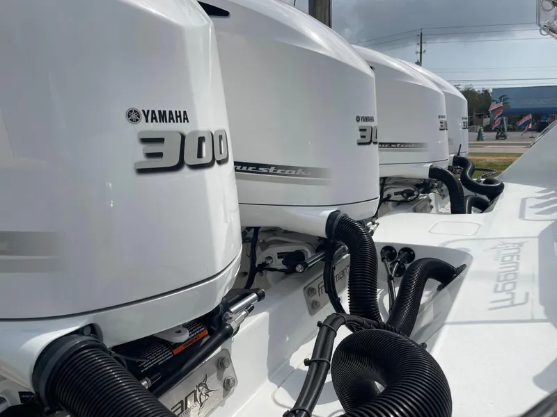 Slide: The Image of Triple Yamaha 300 outboard engines on a 2019 Freeman 37 boat. - 5