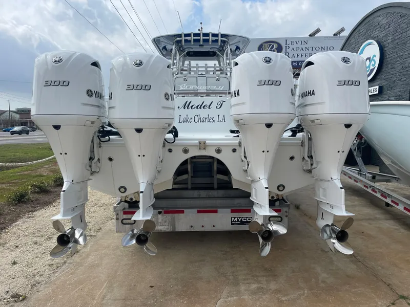 Slide: The Image of Freeman 37 boat with four Yamaha 300 outboard engines, rear view, 2019 model. - 9