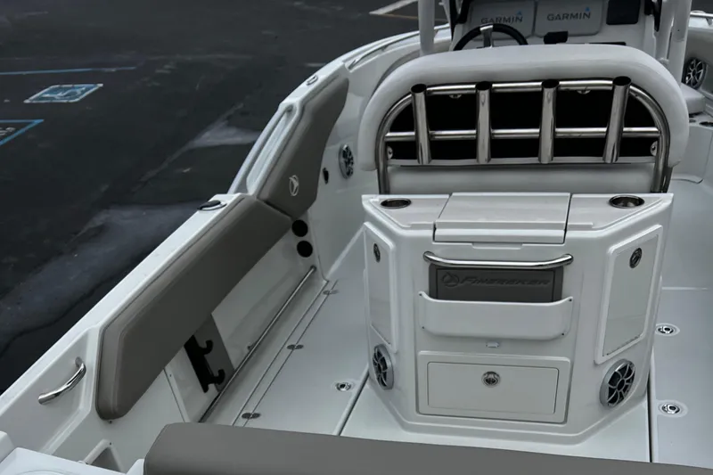 Slide: The Image of 2023 Finseeker 230 CC boat interior with seating and storage compartments. - 14