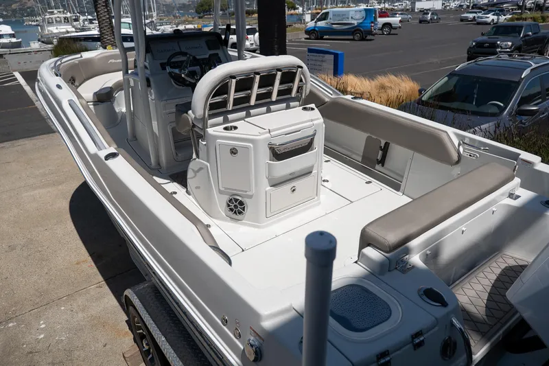Slide: The Image of 2023 Finseeker 230 CC center console boat at marina. - 2