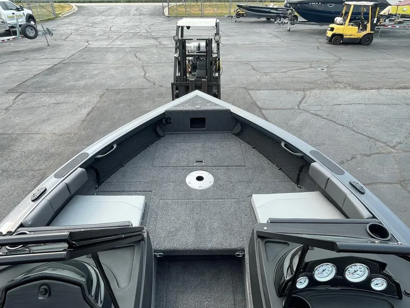 Slide: The Image of 2023 Crestliner 1850 Super Hawk boat interior, front view, docked. - 2