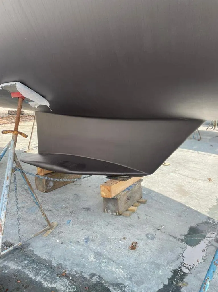 Slide: The Image of Close-up of the keel of a 2000 Catalina 42 Mk II sailboat. - 26