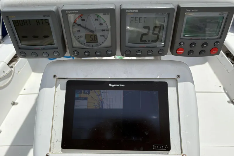 Slide: The Image of Catalina 42 Mk II 2000 yacht navigation instruments displaying speed, depth, and map. - 4