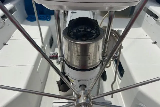 Slide: The Image of Steering wheel and compass on a 2000 Catalina 42 Mk II sailboat. - 5