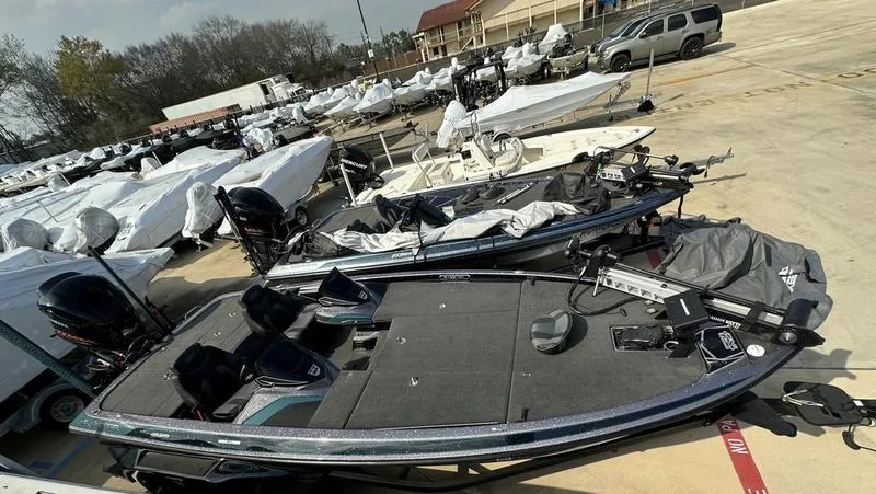 Slide: The Image of 2019 Skeeter FX21 LE bass boat in a dealership lot. - 10