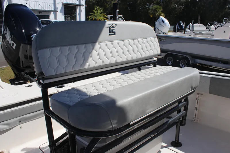 Slide: The Image of 2025 Carolina Skiff 21 Ultra Elite boat seat with stylish gray upholstery. - 13
